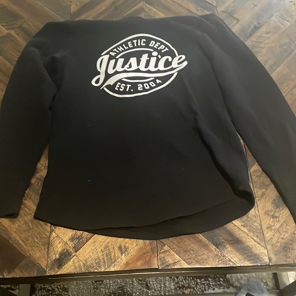 Kids size 10 justice is the company black with pearl white writing